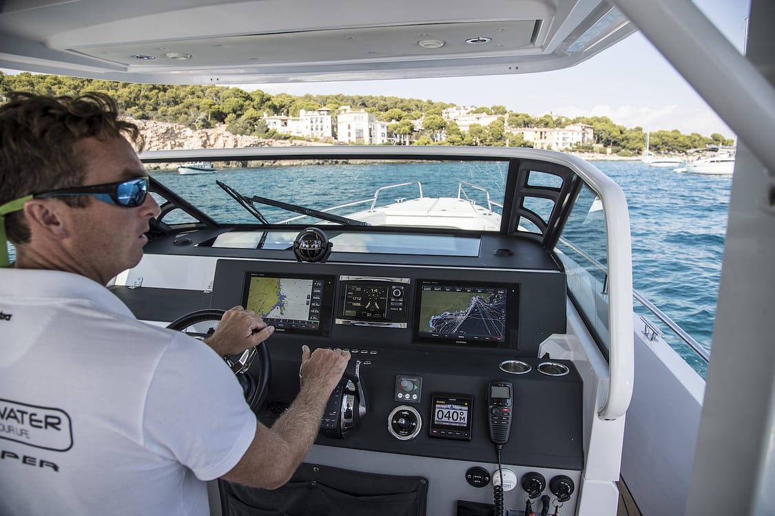 Axopar 37 boat cruising at sea off Mallorca coast