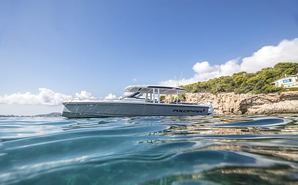 Axopar 37 navigating crystal turquoise Mediterranean waters